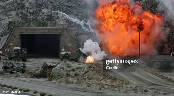 Members fo the UAE Armed forces perform a military drill during the opening of the International Defence Exhibtion and Confrence at the Abu Dhabi...