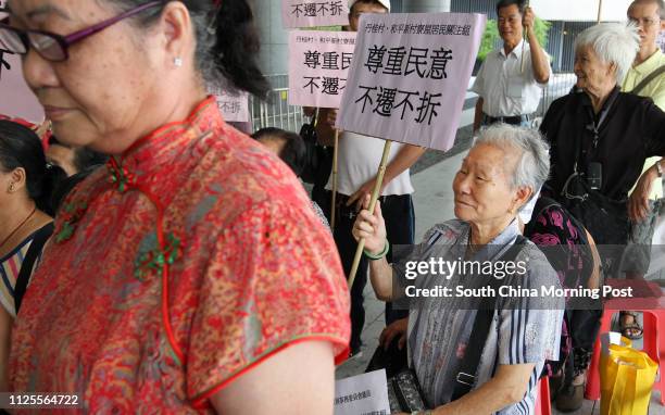 Group of residents from Wo Ping San Tsuen and Tan Kwai Tsuen in Hung Shui Kiu protests against the government's North East New Territories New...