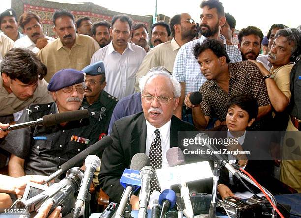 Raja Qureshi, chief prosecutor in the Daniel Pearl case, speaks to the news media from the grounds of the central jail July 15, 2002 in Hyderabad,...