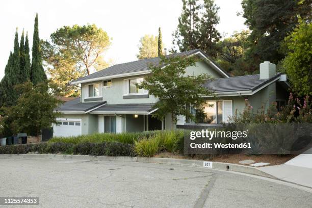 one-family house at the roadside - middle class stock pictures, royalty-free photos & images