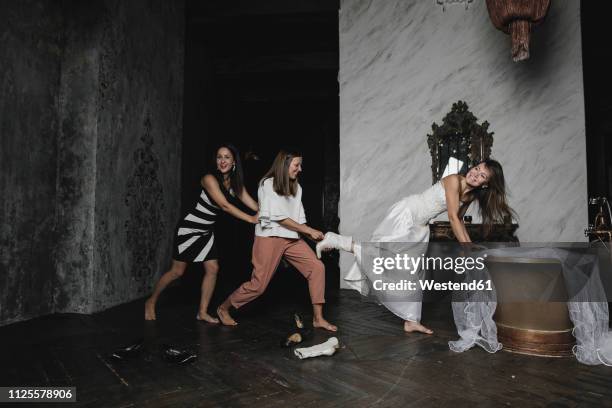 playful friends and bride during wedding preparation - naughty bride fotografías e imágenes de stock