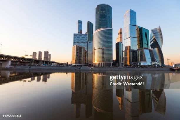russia, moscow, financial district with modern skyscrapers at sunset - moscow skyscraper stock pictures, royalty-free photos & images