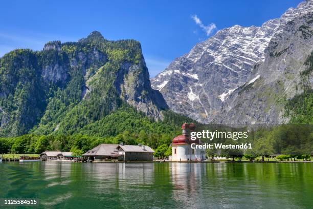 germany, bavaria, berchtesgadener land, st. bartholomew at lake koenigssee - königssee bayern stock-fotos und bilder