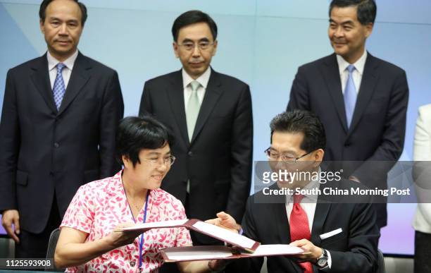 Huang Xiaoling, Deputy chief of the Radio, Film & TV Administration of Guangdong Province and Gregory So Kam-leung, Secretary for Commerce and...
