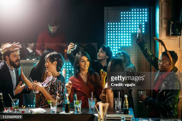 night club party - crowded bar stock pictures, royalty-free photos & images