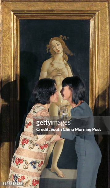 Pansy Ho Chiu-king and Alessandra Schiavo, Consul General of Italy in Hong Kong and Macau, toast during the "Sandro Botticelli's Venus" unveiling...