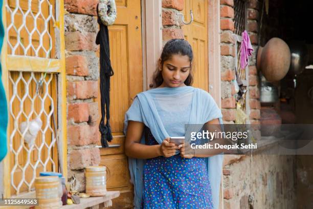 teenager girl - stock images - village stock pictures, royalty-free photos & images