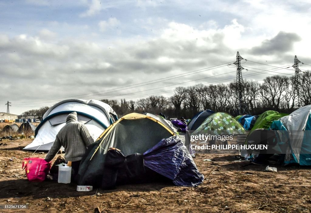 TOPSHOT-FRANCE-EUROPE-BRITAIN-MIGRANTS