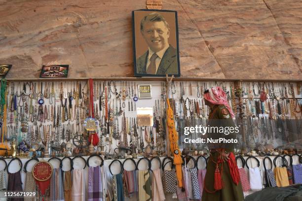 Captain Ali Dormi, a Bedouin soldier seen outside the Urn Tomb , inside the ancient city of Petra, one of Jordan's national treasures and its...