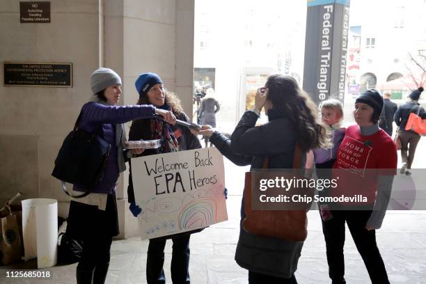 Moms Clean Air Force activists Martha Roberts, Molly Rauch and Liz Brandt, holding her daughter Natalia Bednar welcome Environmental Protection...