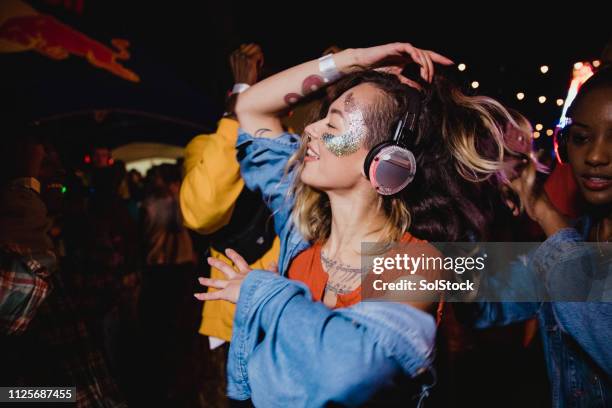 lost in the silent disco - disco dancer stock pictures, royalty-free photos & images
