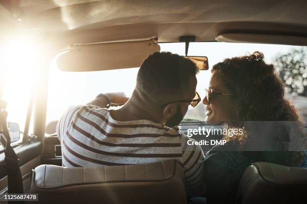 they found true love on a road trip - black people kissing stock pictures, royalty-free photos & images