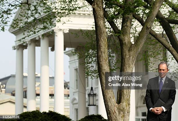 New York Mayor Michael Bloomberg waits for his turn to speak to the media after a meeting with President Barack Obama on immigration at the White...