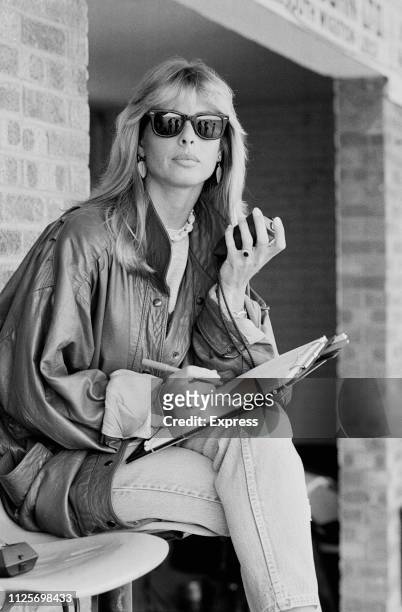 British model Stephanie McLean time his partner, British motorcycle racer Barry Sheene, UK, 22nd April 1984.