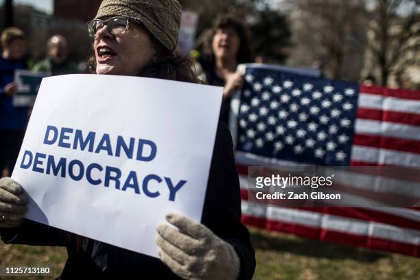 Demonstrators gather in Lafayette Square during a demonstration organized by the American Civil Liberties Union protesting President Donald Trump's...
