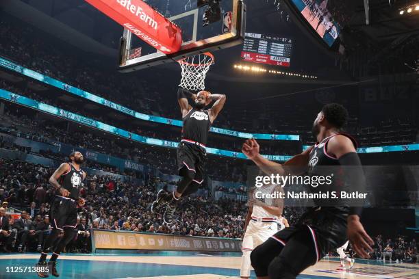 Dwyane Wade throws an alley oop to LeBron James of Team LeBron during the 2019 NBA All-Star Game on February 17, 2019 at the Spectrum Center in...