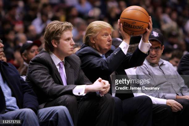 Eric Trump and Donald Trump attend the Chicago Bulls vs New Jersey Nets game at the IZOD Center on October 31, 2007 in East Rutherford, New York.