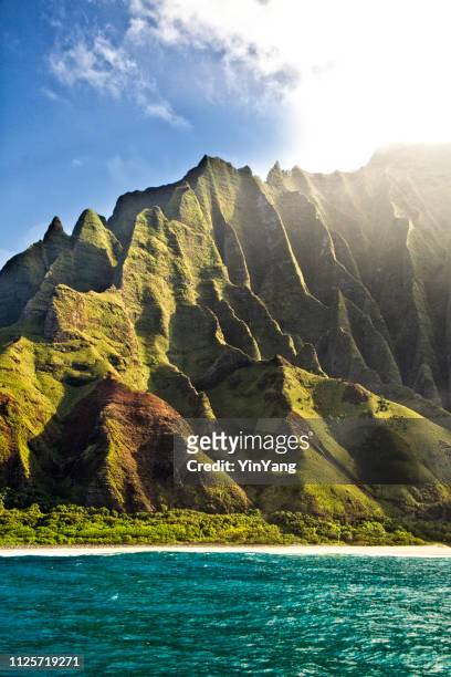 mysterious misty na pali coast and waimea canyon, kauai, hawaii - na pali coast stock pictures, royalty-free photos & images