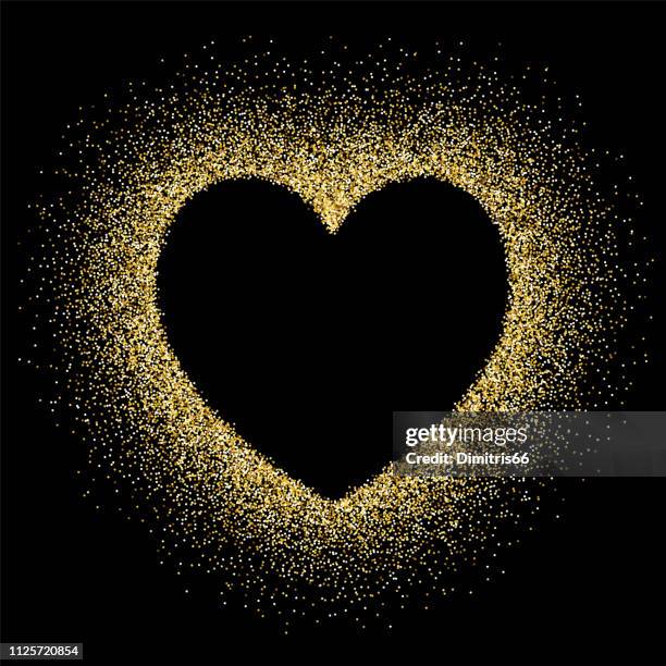 gold glitter with heart shape empty space on black background - gold heart frame stock illustrations