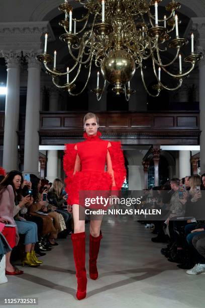 Model presents a creation from designer David Koma during his 2019 Autumn / Winter collection catwalk show at London Fashion Week in London on...