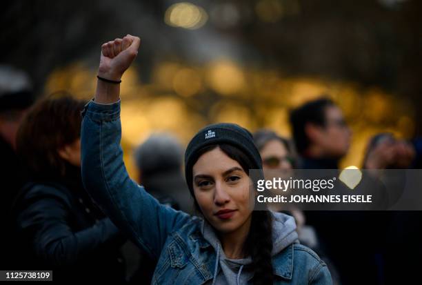 Woman participates in a President's Day protest against US President Donald Trump immigration policy at the Union Square on February 18, 2019 in New...