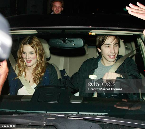 Actress Drew Barrymore and actor Justin Long at Mr Chow's restaurant in Beverly Hills on February 22, 2008 in Los Angeles California.