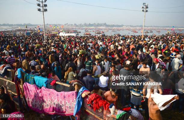Indian Hindu devotees take a bath on the auspicious day of 'Maghi Purnima' at Sangam -- the confluence of the Ganges, Yamuna and mythical Saraswati...