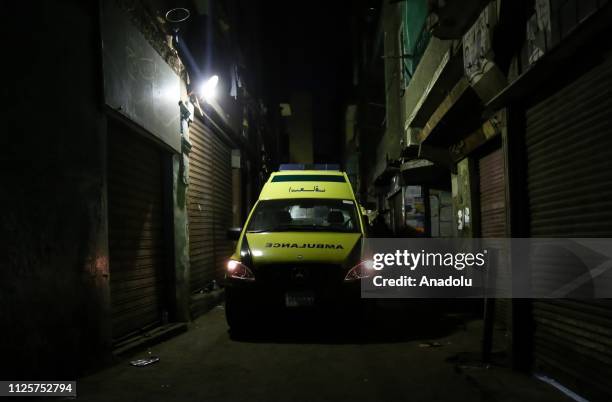 An ambulance is arrived at the scene of a suicide bombing after an explosion rocked Egypt's capital, Cairo, when a man blew himself up behind...