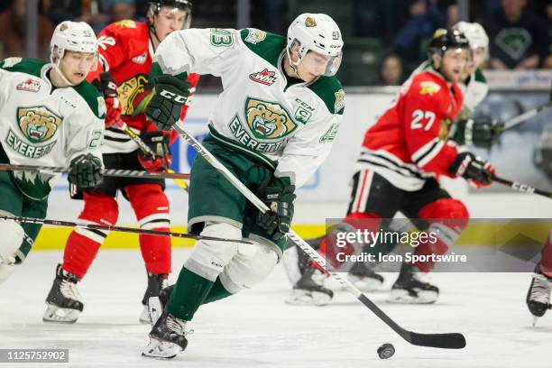 Everett Silvertips center Connor Dewar tries to collect a bouncing puck in the third period of a game between the Everett Silvertips and the Portland...