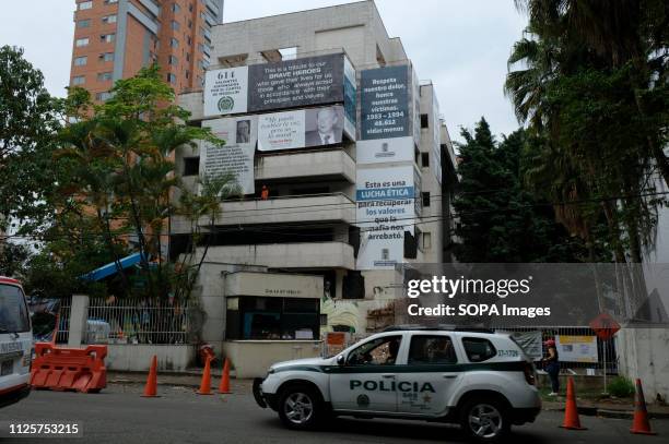 Police car seen in front of the Monaco building while patrolling the sector. 25 years after the death of Pablo Escobar, the Medellín Mayors office...