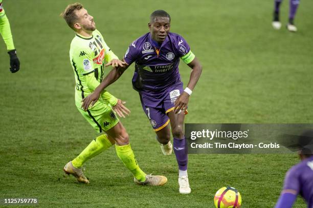 January 27: Max Gradel of Toulouse defended by Flavien Tait of Angers during the Toulouse FC V Angers, French Ligue 1 regular season match at the...