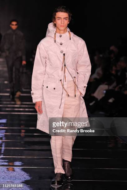 Model walks the runway during the BOSS Womenswear & Menswear Fashion Show in February 2019 - New York Fashion Week on February 13, 2019 in New York...