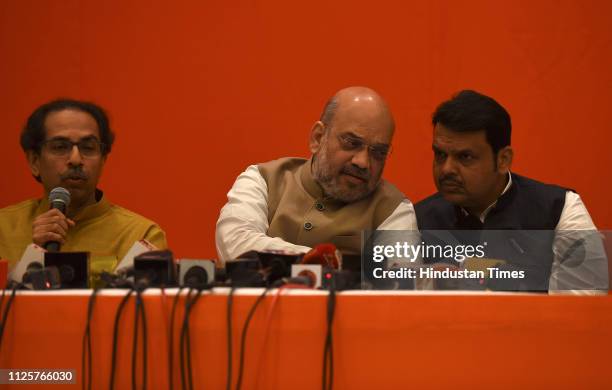 Shiv Sena President Uddhav Thackeray along with BJP national president Amit Shah and Maharastra Chief minister Devendra Fadnavis during a press...