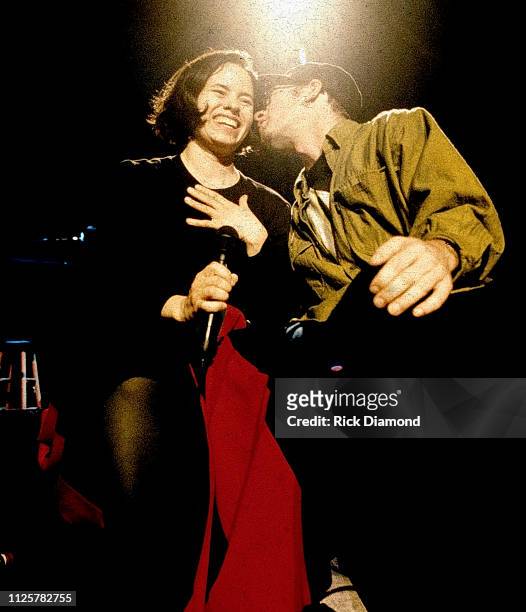 S Michael Stipe joins Natalie Merchant of 10,000 Maniacs on stage at The Fox Theater in Atlanta Georgia circa 1992
