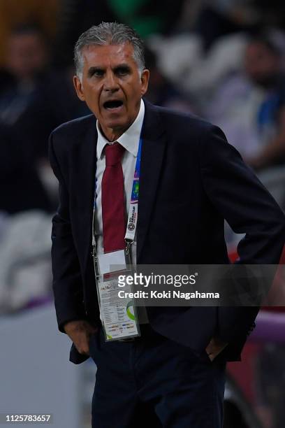 Iran head coach Carlos Quieroz gives advice to Seyed Ashkan Dejagah of Iran during the AFC Asian Cup semi final match between Iran and Japan at Hazza...