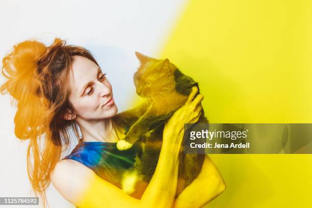 woman holding cat, cat lady, crazy cat lady, cat love, pet owner - soltanto un animale foto e immagini stock