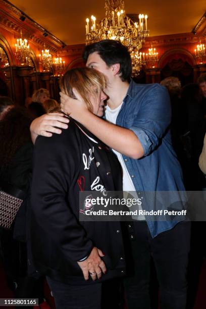 Michele Bernier and her son Enzo Gaccio pose after the Michele Bernier One Woman Show "Vive Demain !" at Theatre des Varietes on January 28, 2019 in...