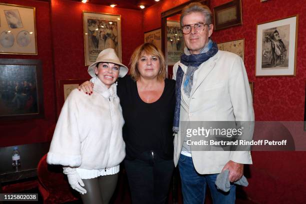 Michele Bernier standing between Chief Executive of the Lucien Barriere Group, Dominique Desseigne and Alexandra Cardinale pose after the Michele...