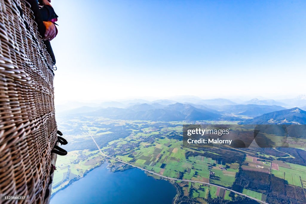 Aerial view on lake shore from hot air balloon.