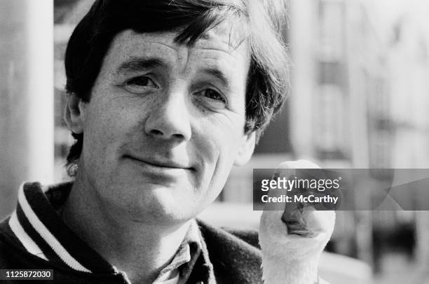 English comedian, actor, writer and television presenter Michael Palin with a goose, UK, 14th October 1980.