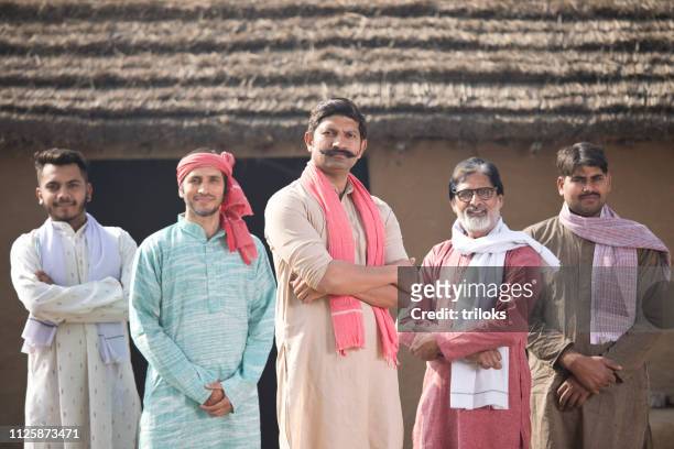 group of farmers at village - village stock pictures, royalty-free photos & images
