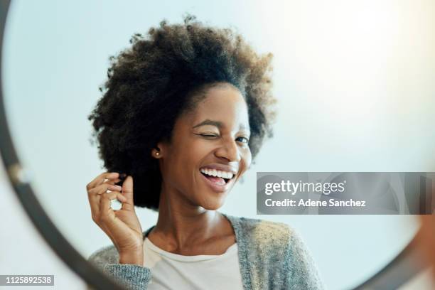 adjust your crown and get the day started - smiley wink stock pictures, royalty-free photos & images