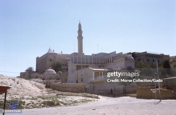 The minaret and shrine of the Nebi Yunus Mosque of the Prophet Jonah in Mosul, Iraq, August, 1971. The Sunni religious complex was demolished by ISIS...
