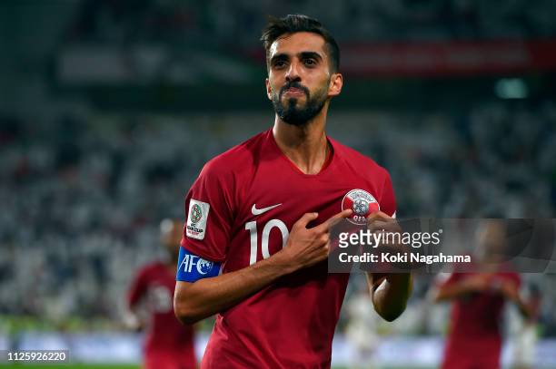 Hasan Al Haydos of Qatar celebrates scoring their third goal during the AFC Asian Cup semi final match between Qatar and United Arab Emirates at...