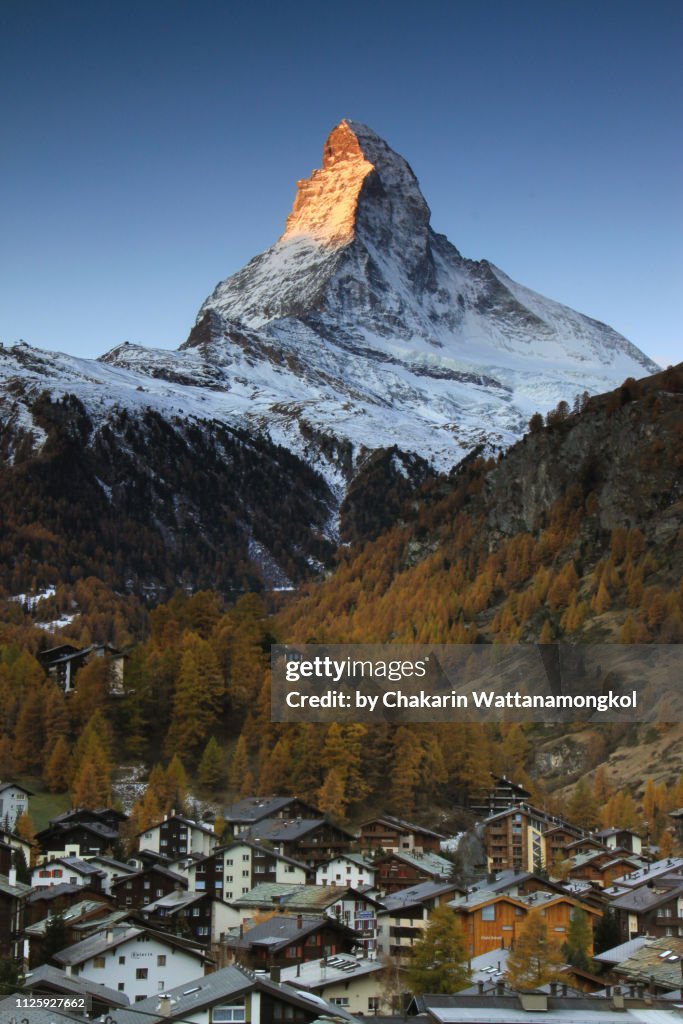 Matterhorn (Zermatt, Switzerland) - golden sunlight touching the tip of Matterhorn.