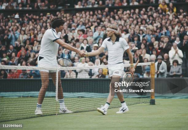 Bjorn Borg of Sweden shakes hands with Victor Amaya following their Men's Singles first round match at the Wimbledon Lawn Tennis Championship on 26...