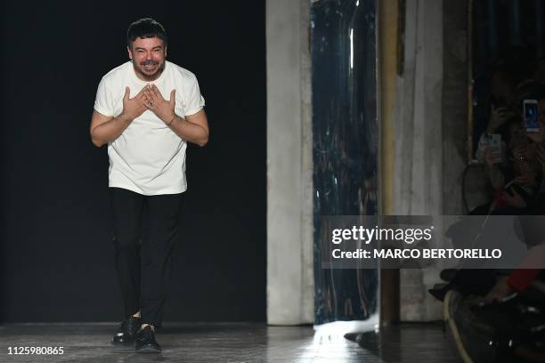 Fashion designer Alberto Zambelli acknowledges applause following his women's Fall/Winter 2019/2020 collection fashion show, on February 20, 2019 in...