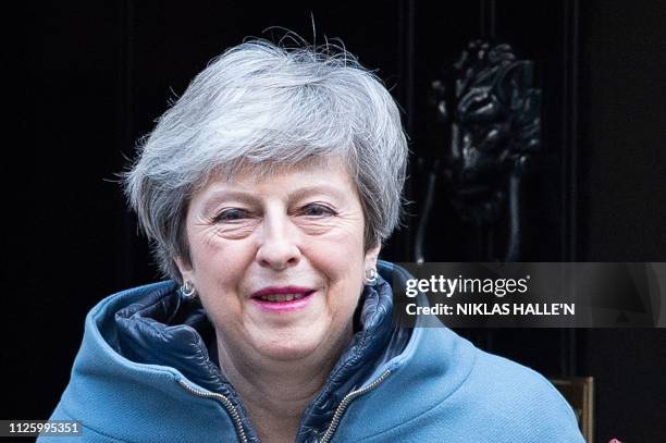 Britain's Prime Minister Theresa May leaves 10 Downing street in central London on February 20, 2019 ahead of Prime Minister's Questions . British...