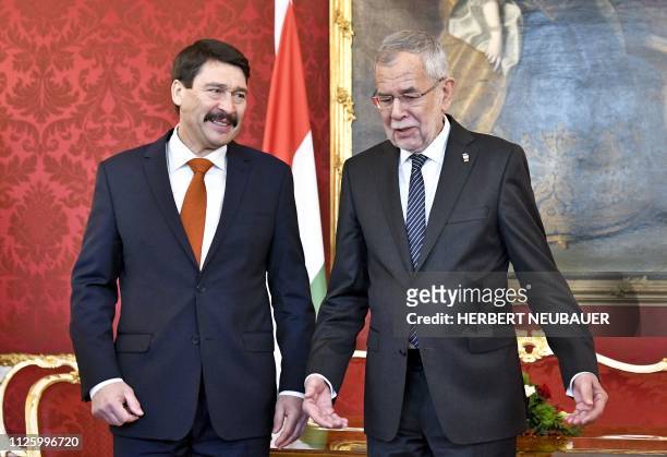 Austrian President Alexander Van Der Bellen welcomes his Hungarian counterpart Janos Ader at Hofburg palace in Vienna, Austria, on February 20, 2019....