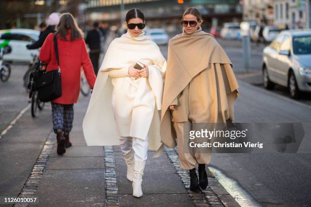 Katarina Petrovic and Celine Aagaard wearing cape seen outside Blanche during the Copenhagen Fashion Week Autumn/Winter 2019 - Day 1 on January 29,...